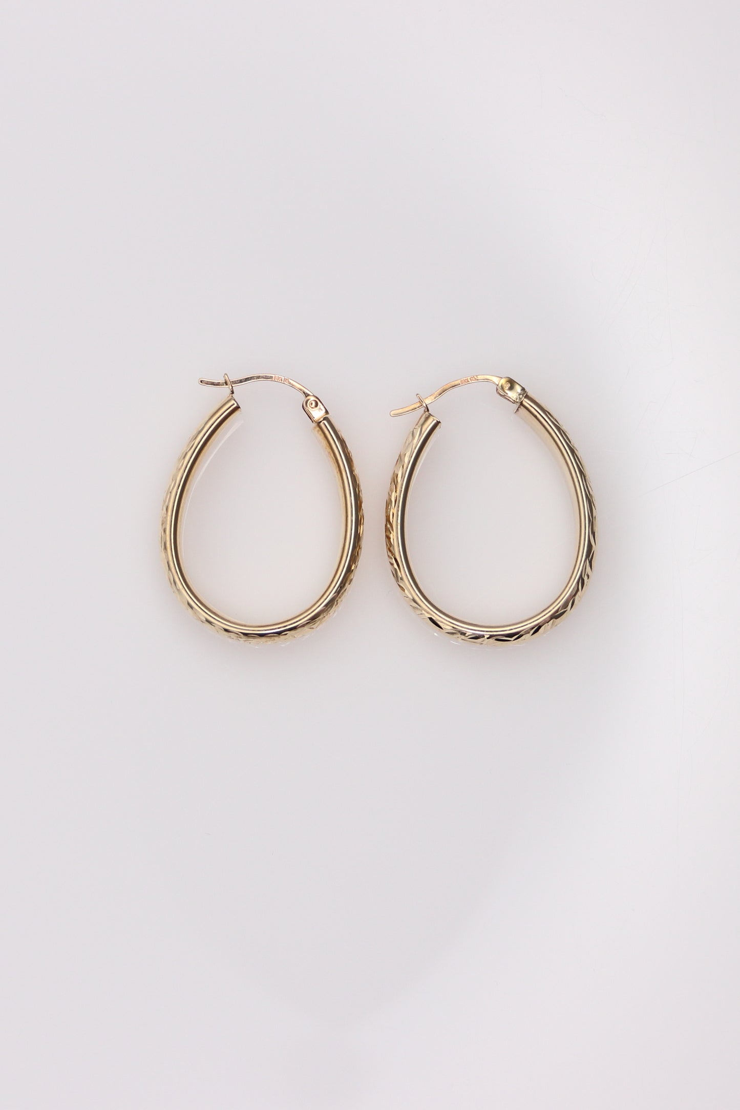 14K Yellow Gold Diamond Cut Oval Hoops