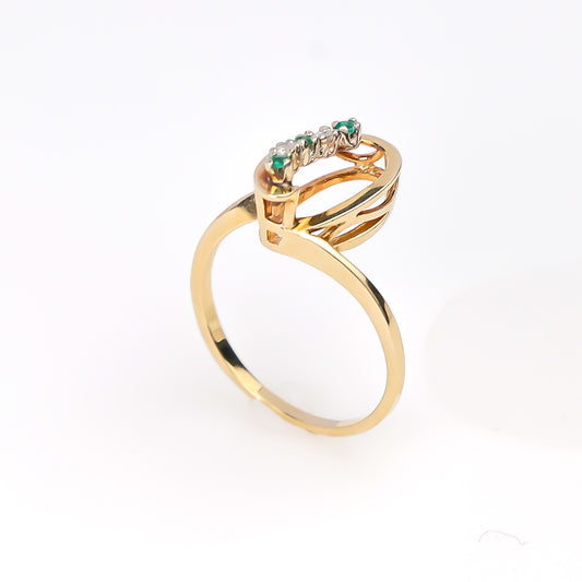 14k Ring with Small Green Stones