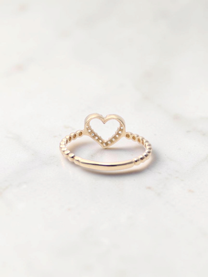 Zafrah 14k yellow gold heart bead ring featuring sparkling CZ stones on a delicate textured band