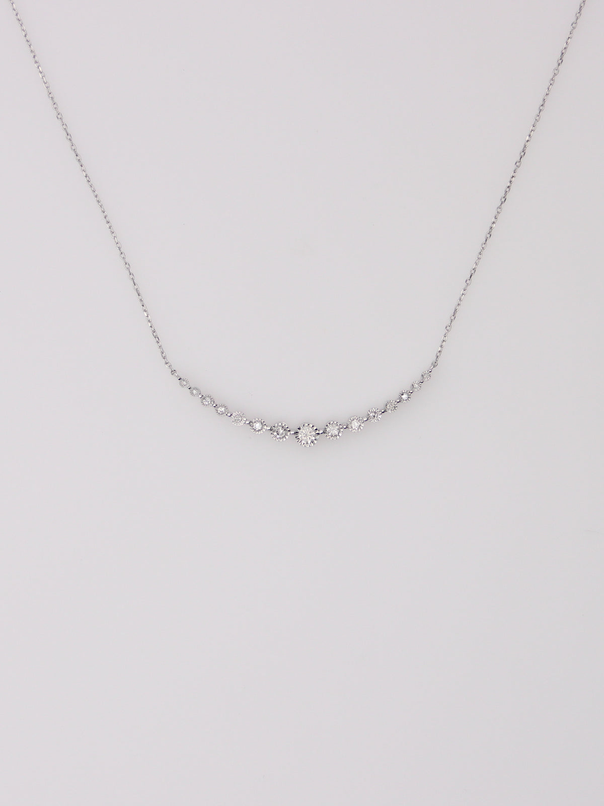10K White Gold Curved Diamond Pendant Necklace