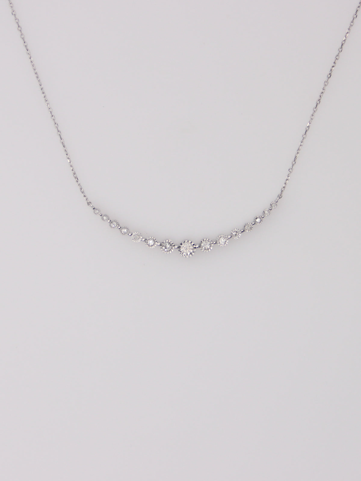 10K White Gold Curved Diamond Pendant Necklace