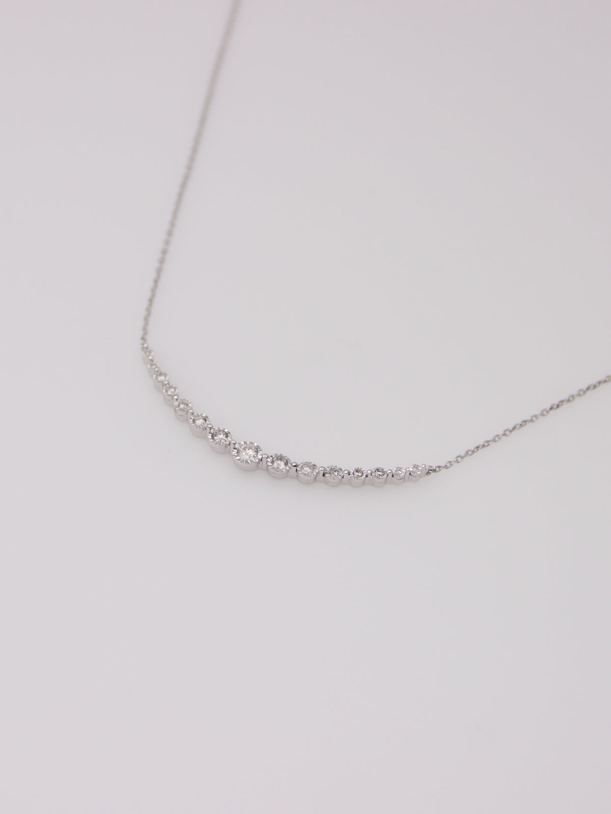 10K White Gold Curved Diamond Pendant Necklace