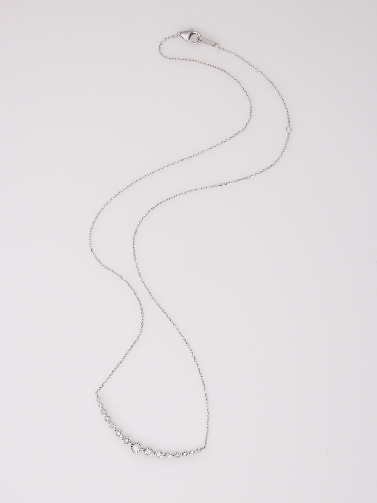 10K White Gold Curved Diamond Pendant Necklace