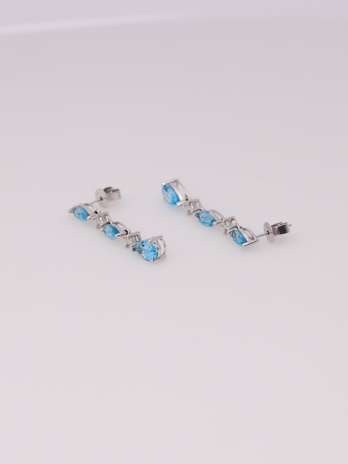 10K White Gold Blue Topaz and Diamond Earrings