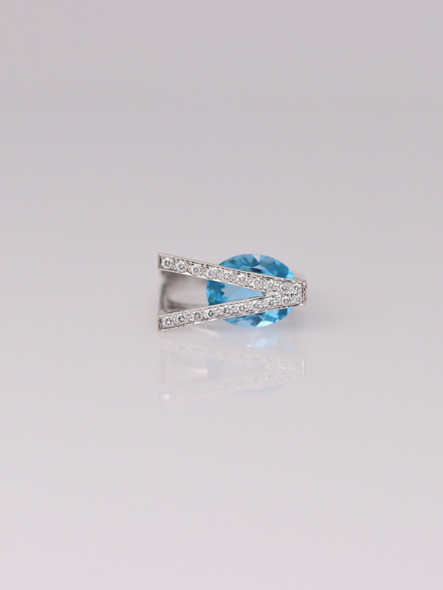18K White Gold Sky Blue Topaz and Diamond Abstract Ring