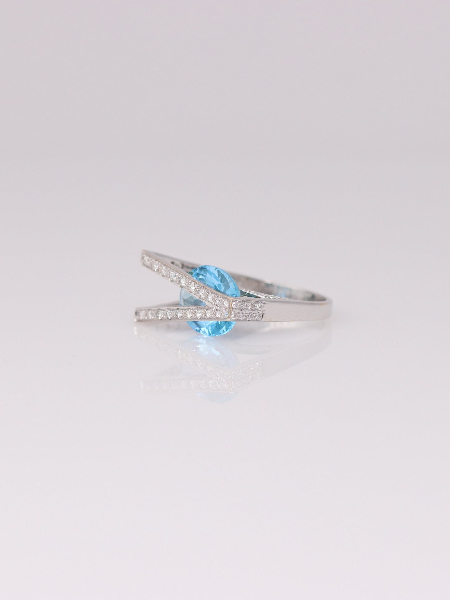 18K White Gold Sky Blue Topaz and Diamond Abstract Ring