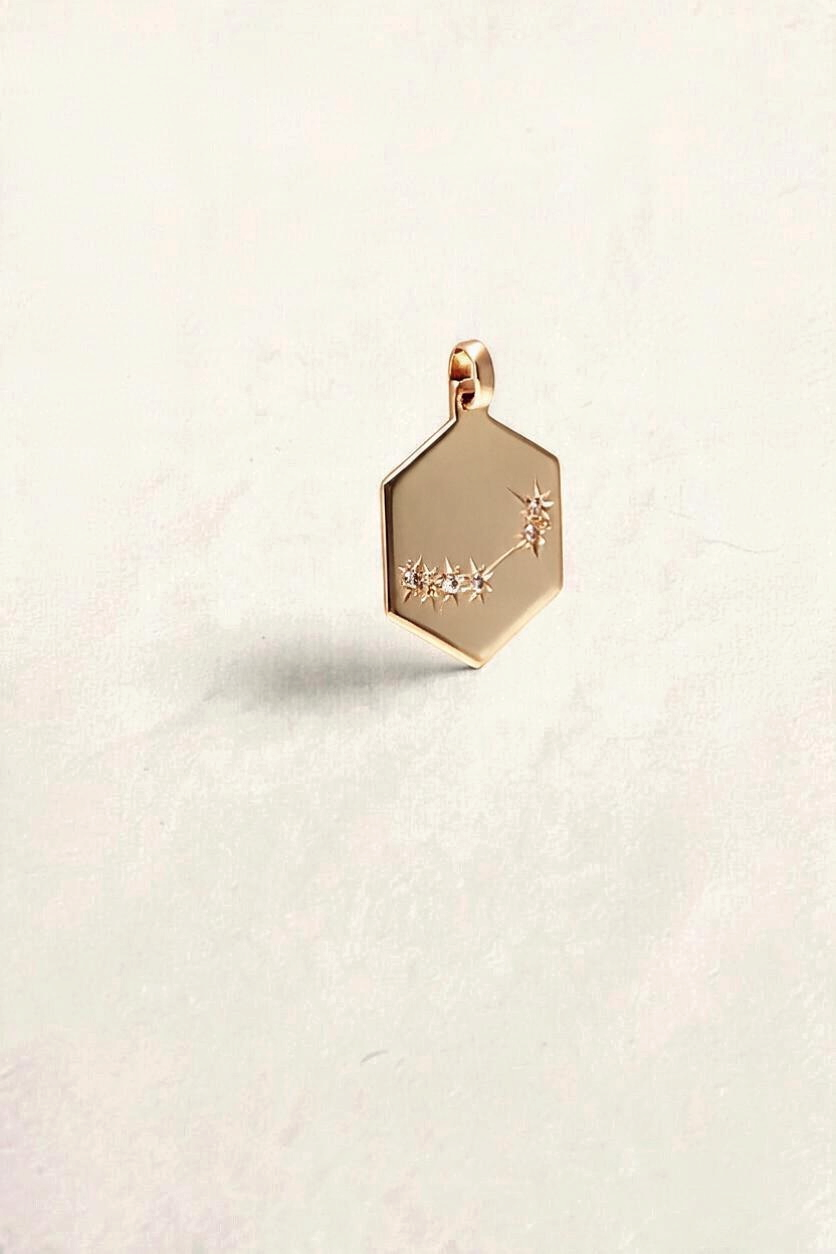 Zafrah 14k yellow gold hexagonal Capricorn pendant featuring six sparkling round diamonds in a constellation design