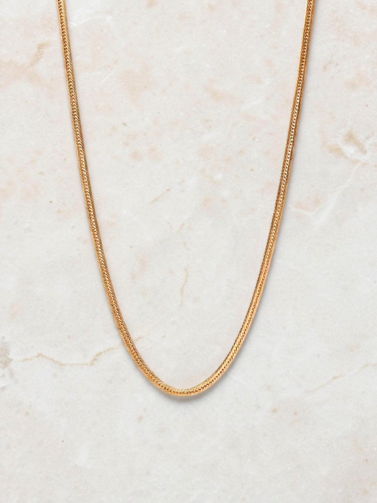 Zafrah 14k yellow gold snake chain necklace, 21.5 inches long with a 2.75 mm width.