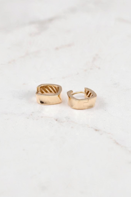 Zafrah thick rectangle huggie hoop earrings crafted in 14k solid gold with a polished finish.