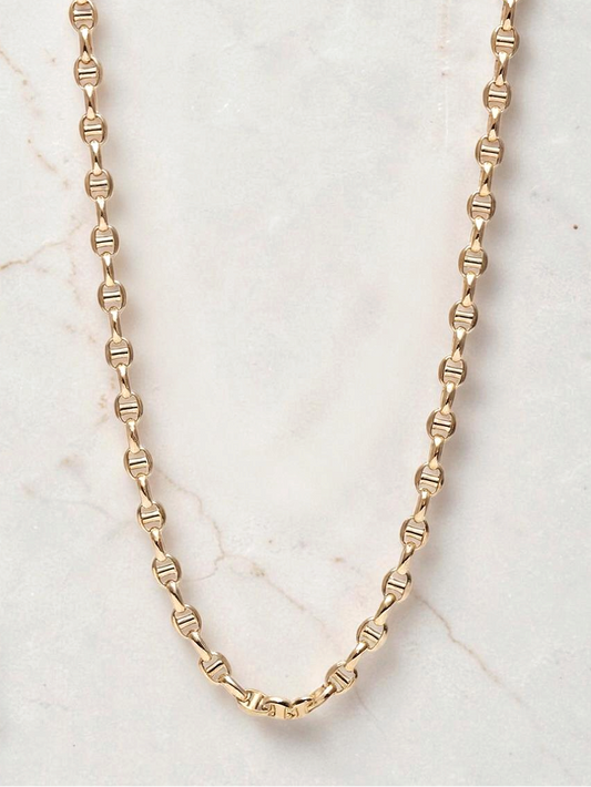 Zafrah 14k yellow gold mariners link chain necklace, 4.5mm wide and 21.5 inches long on a marble background.