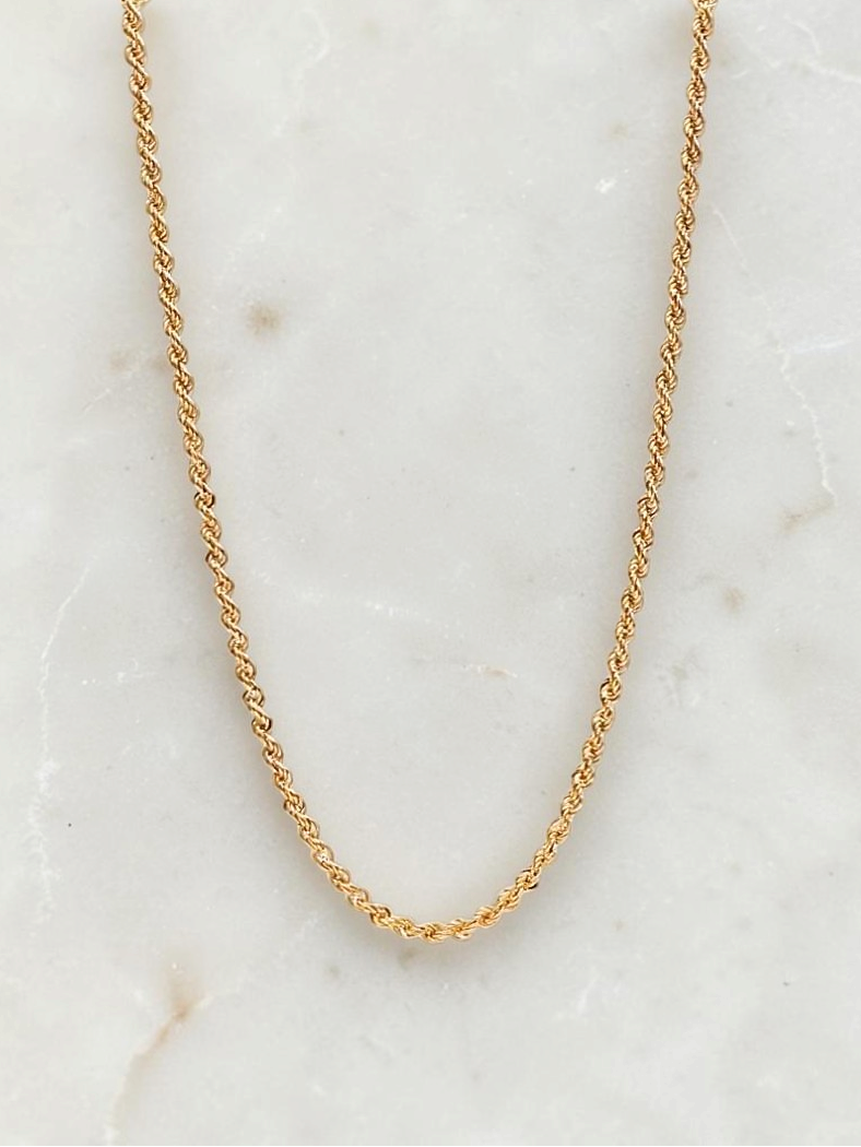 Zafrah 14k yellow gold 3mm rope chain necklace, 21.5 inches long, displayed on a white marble surface.
