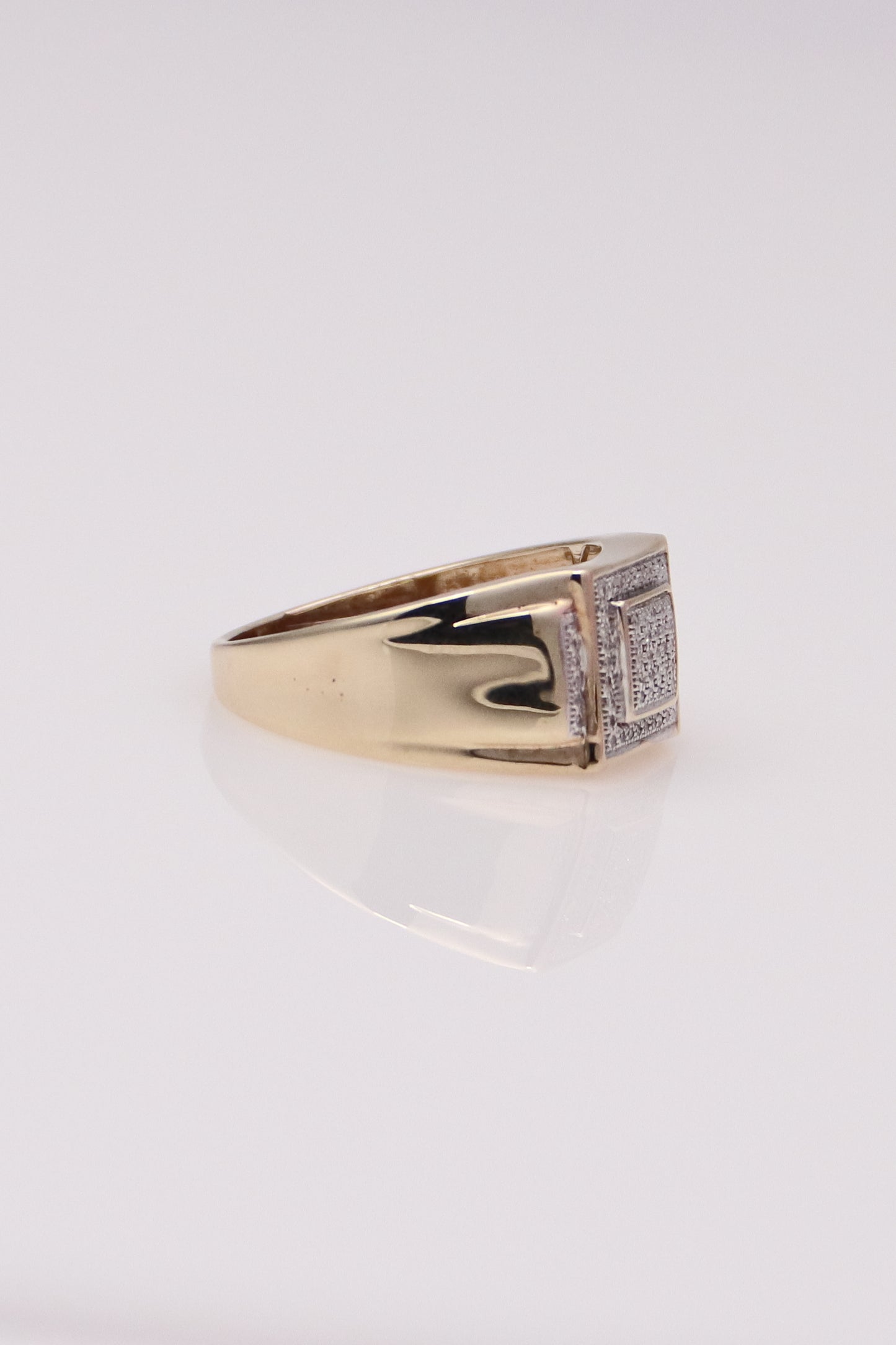 10K Graduated Moissanite Ring