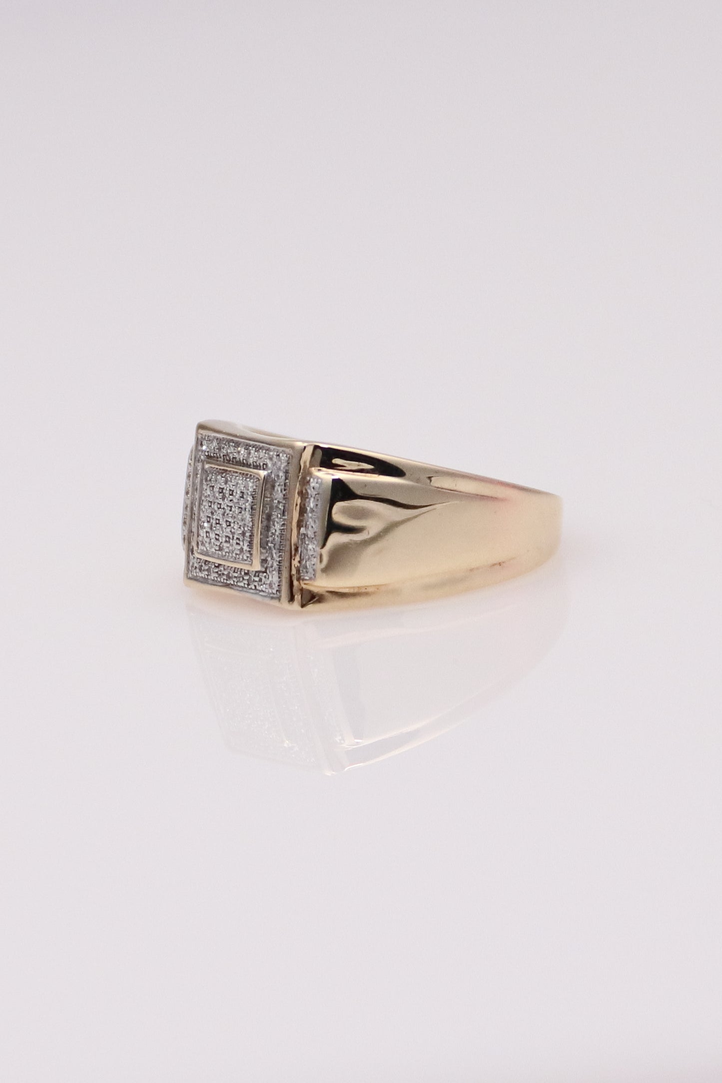 10K Graduated Moissanite Ring
