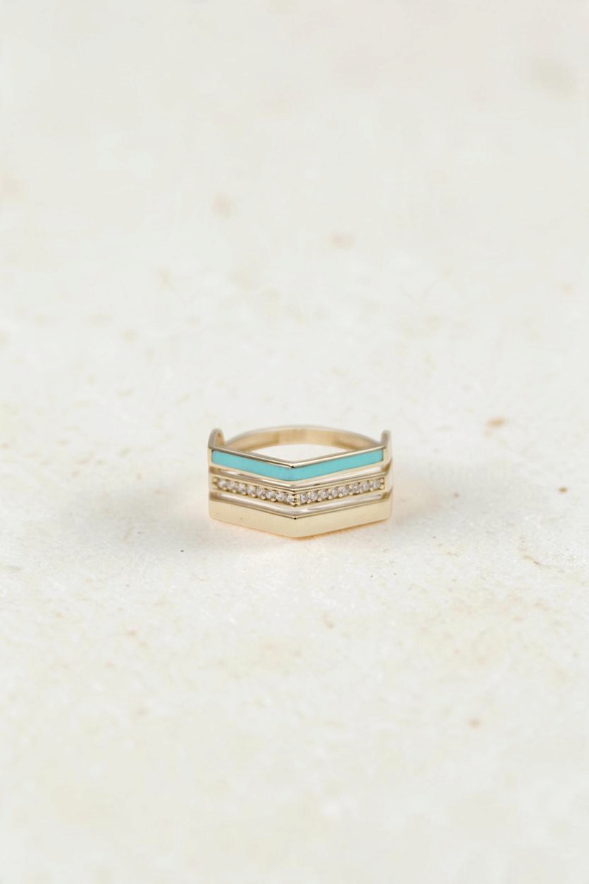Zafrah 14k solid gold triple line ring featuring a turquoise enamel band and a row of sparkling diamonds
