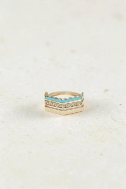 Zafrah 14k solid gold triple line ring featuring a turquoise enamel band and a row of sparkling diamonds