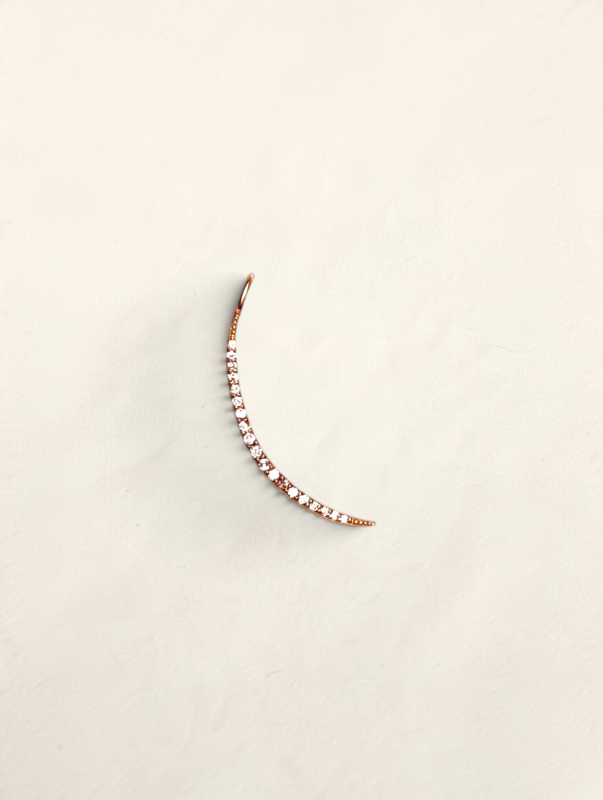 Zafrah 14k yellow gold crescent moon pendant featuring sparkling pavé diamonds on a minimalist curved design