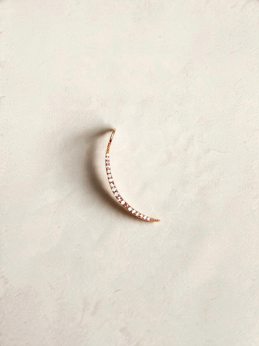 Zafrah 14k yellow gold crescent moon pendant featuring sparkling pavé diamonds on a minimalist curved design