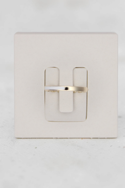 Zafrah 14k solid gold chain link ring in size 7, displayed on a white jewelry stand.