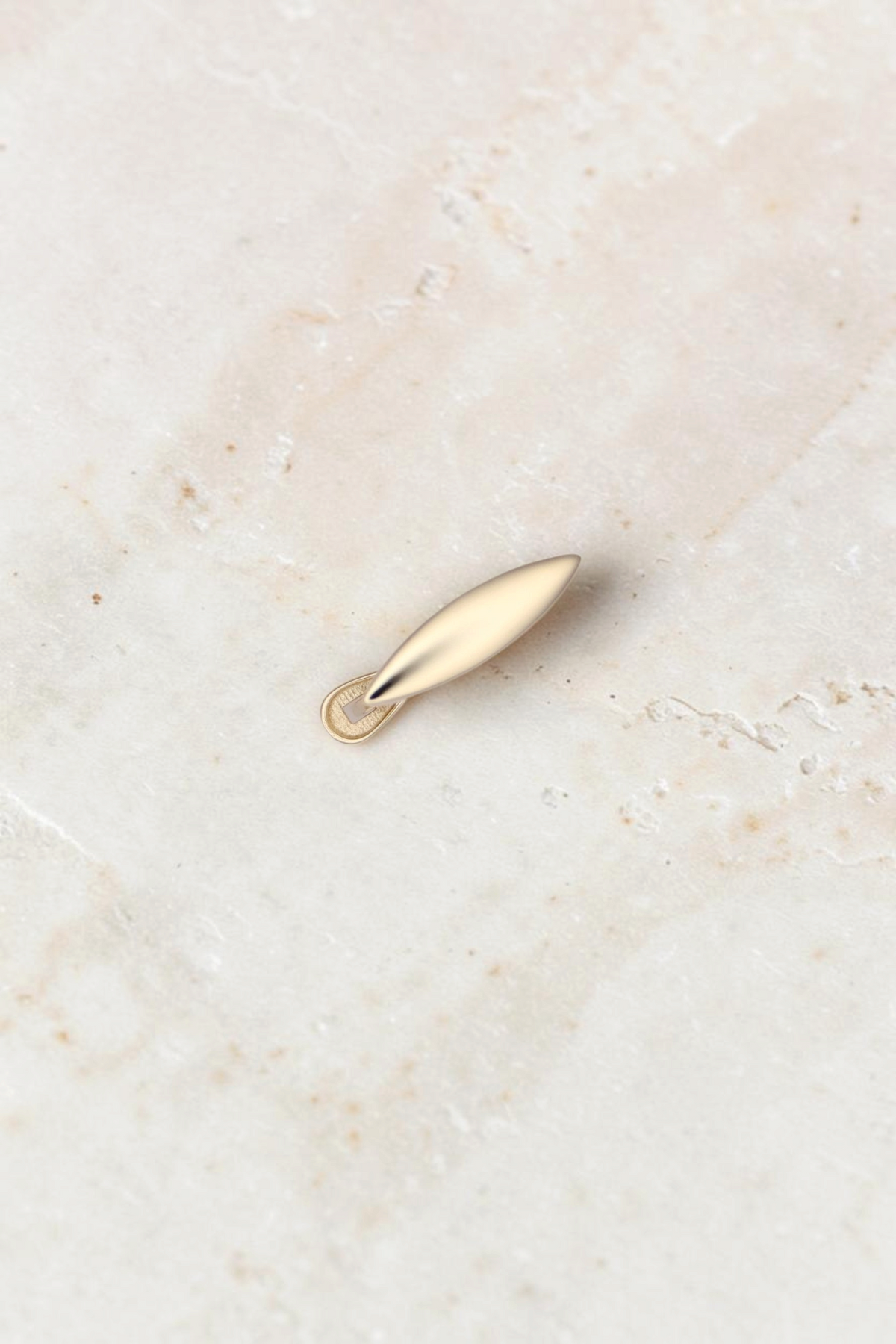 Zafrah 14k solid gold vertical marquise earrings with a minimalist clip design on a clean background.