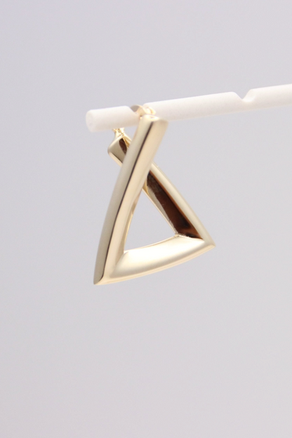 Zafrah 14k solid gold triangular hoop earrings with a minimalist geometric design and polished finish.