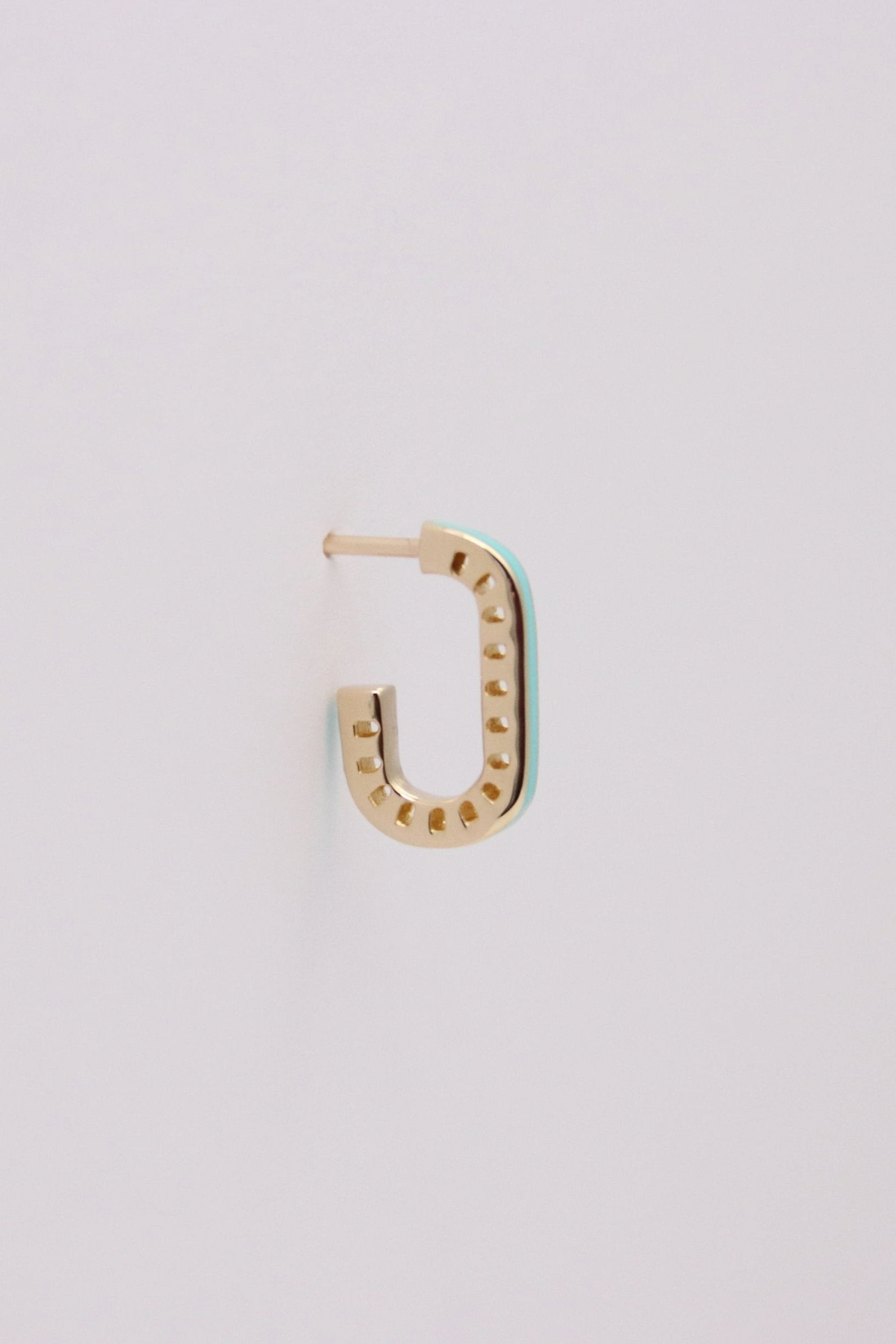 Zafrah 14k solid gold rectangular stud earring featuring a dainty turquoise inlay and curved edges.