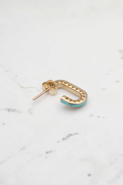 Zafrah 14k solid gold short curvy rectangular stud earring with turquoise enamel inlay on a white background