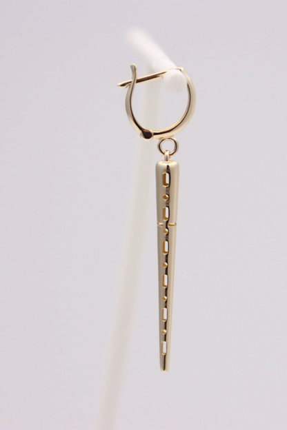 Zafrah 14k solid gold drop hoop earrings featuring a polished spiked charm with cut-out detailing.