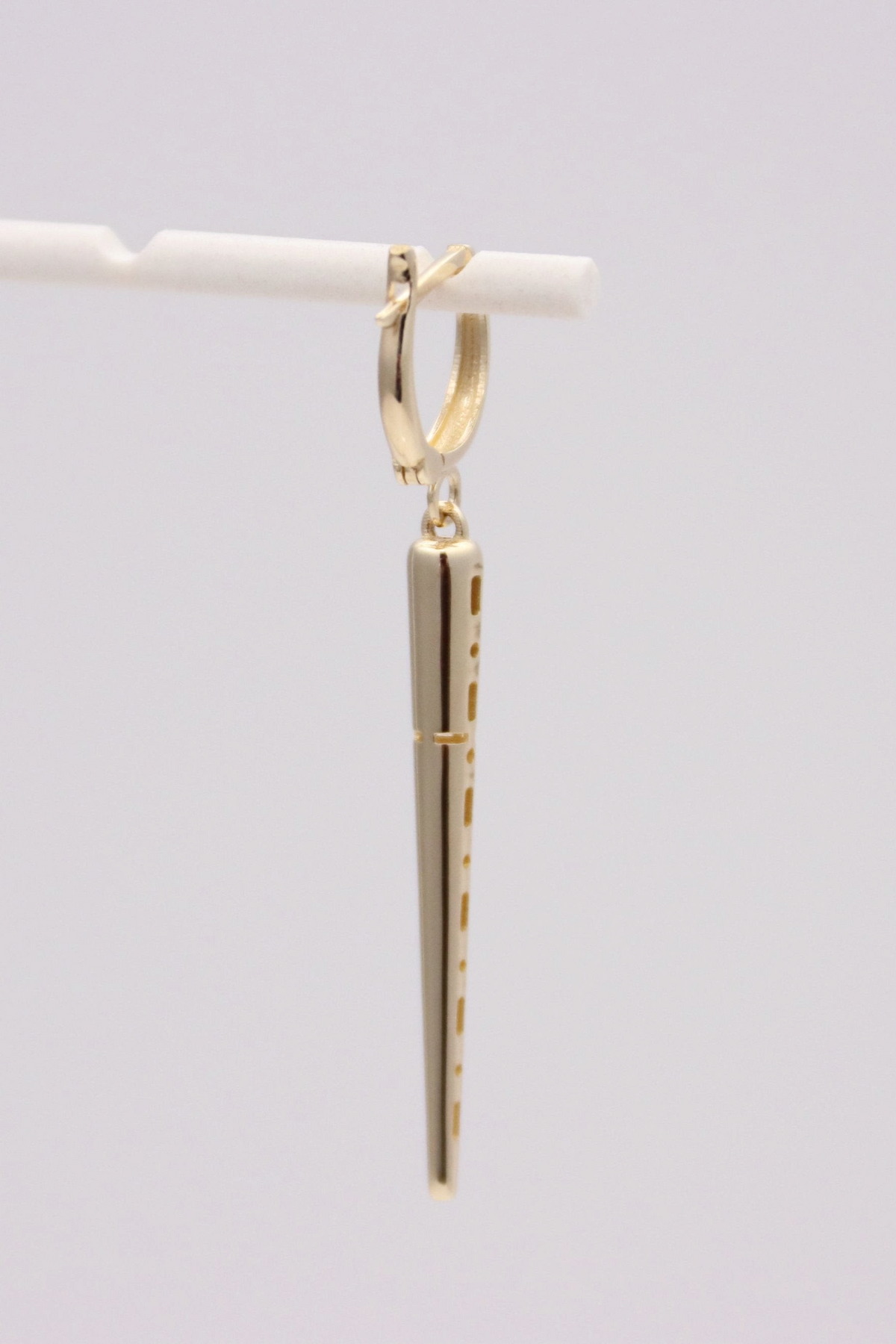 Zafrah 14k solid gold drop hoop earrings featuring a polished spiked charm for a dazzling shine.