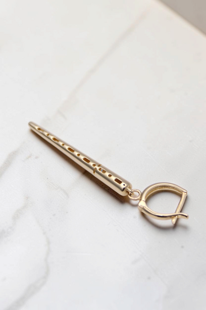 Zafrah 14k solid gold drop hoop earrings featuring a polished spiked charm with cut-out details.