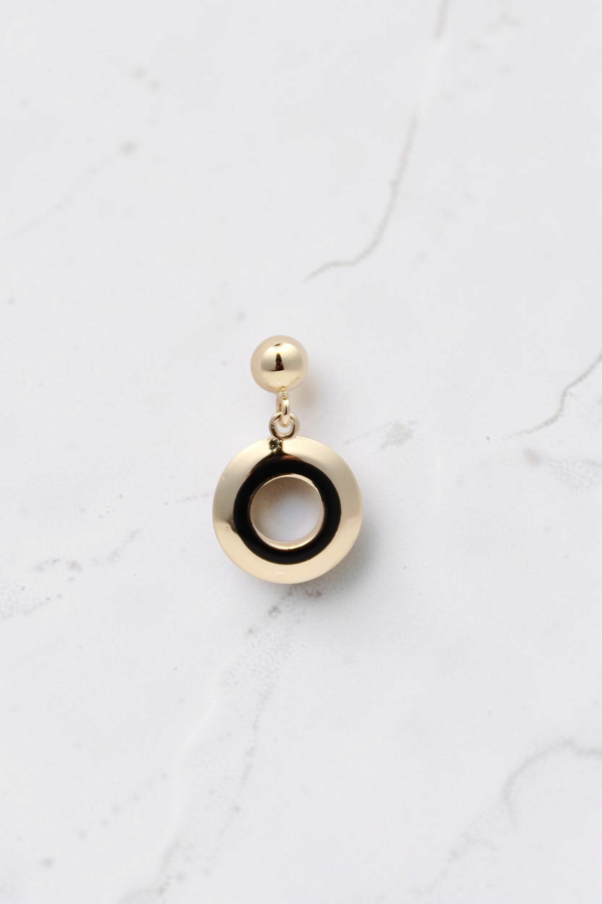 Zafrah 14k solid gold circle drop earrings featuring a black and white enamel inlay design