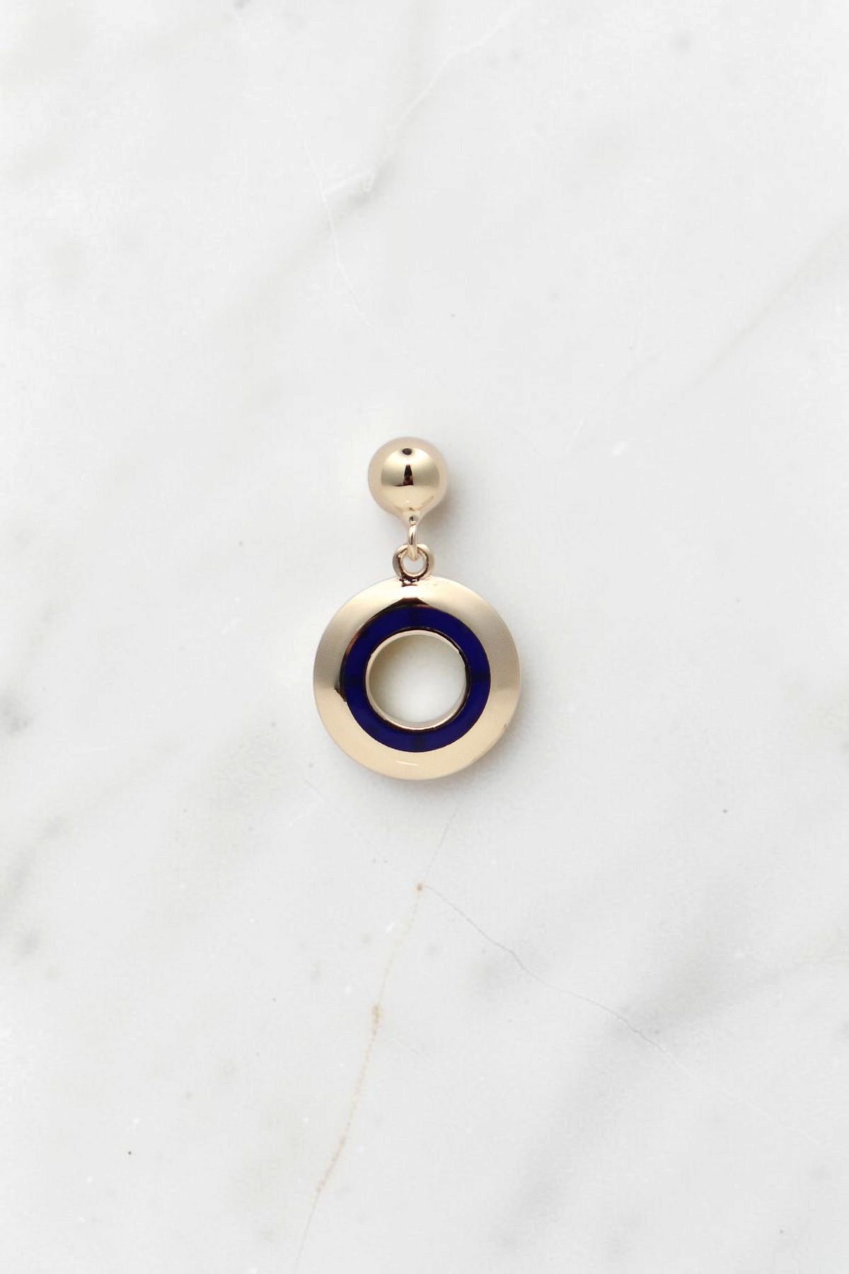 Zafrah 14k solid gold circle drop earrings featuring a polished gold finish and a vibrant blue enamel inlay.