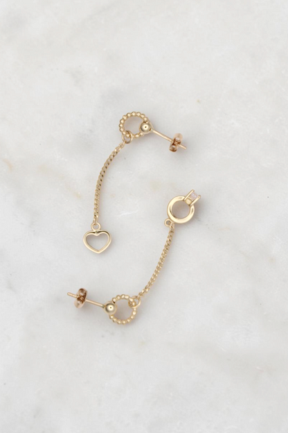 Zafrah 14k solid gold drop earrings featuring a bead ring, open heart charm, and a small ring with a round CZ stone.