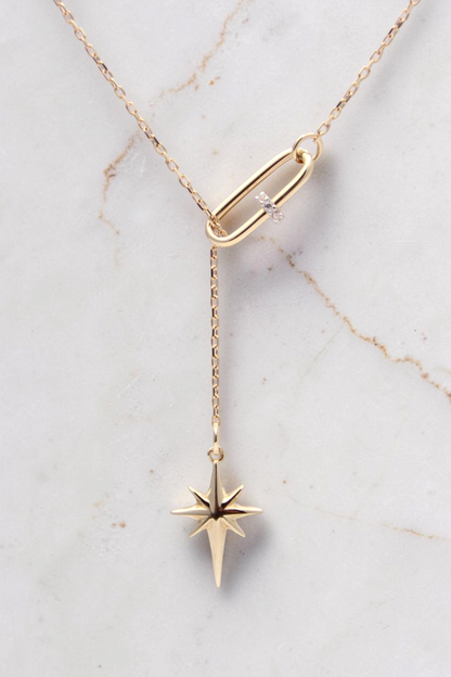 Zafrah 14k solid gold 18-inch necklace featuring a paper clip link and a dangling North Star pendant