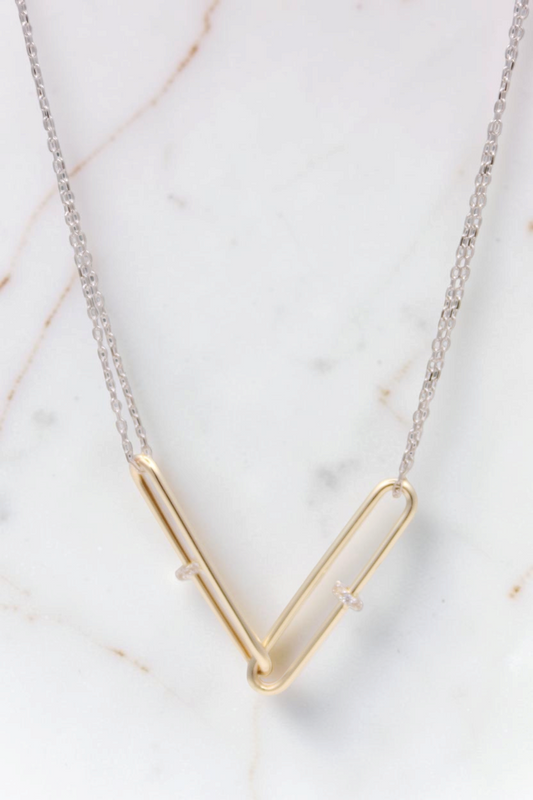 Zafrah 14kt gold double paperclip necklace featuring two interlocking links on a white gold cable chain