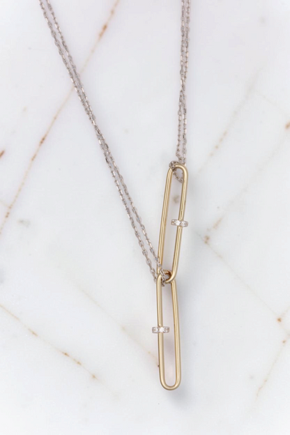 Zafrah 14kt gold double paperclip necklace featuring two yellow gold links on a white gold cable chain