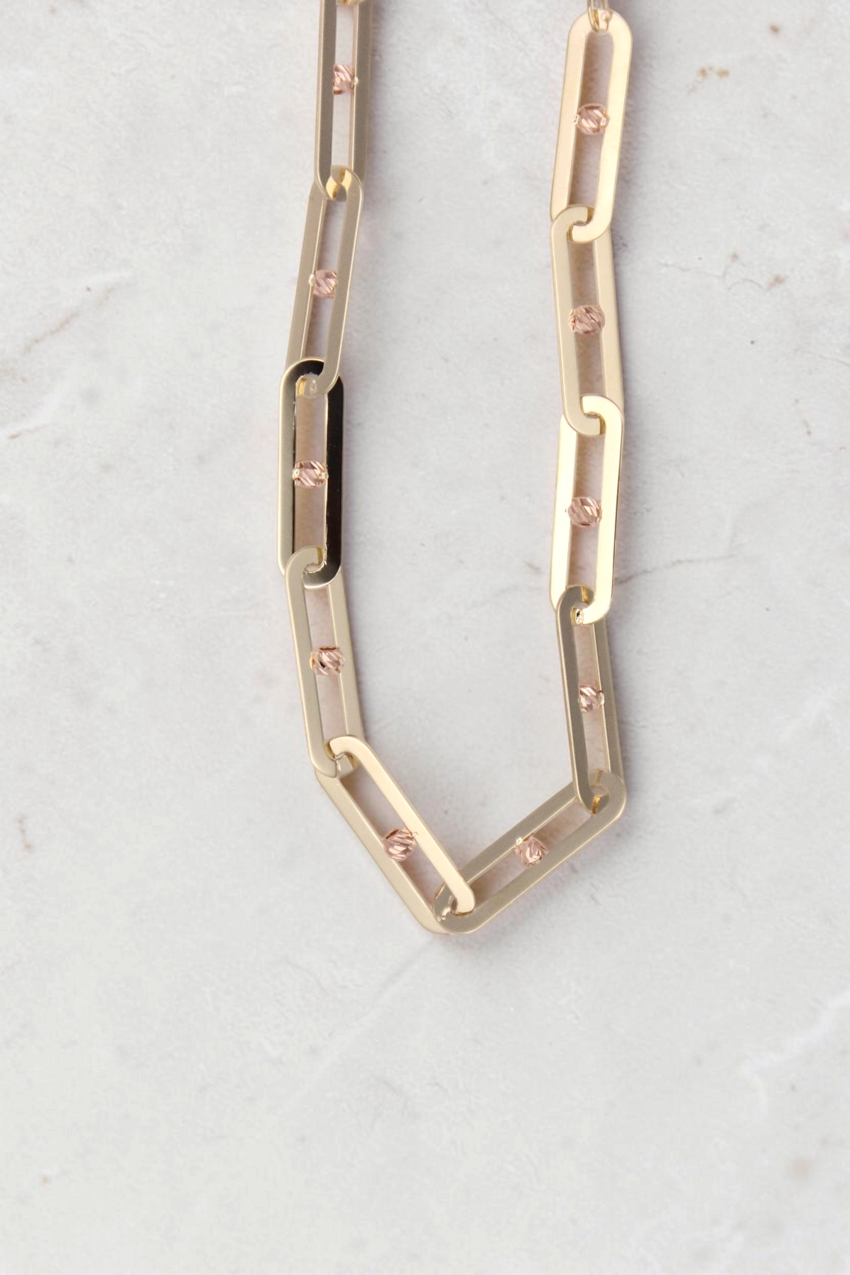 Zafrah 14k solid gold paperclip link bracelet with adjustable 7 to 8 inch chain and polished finish