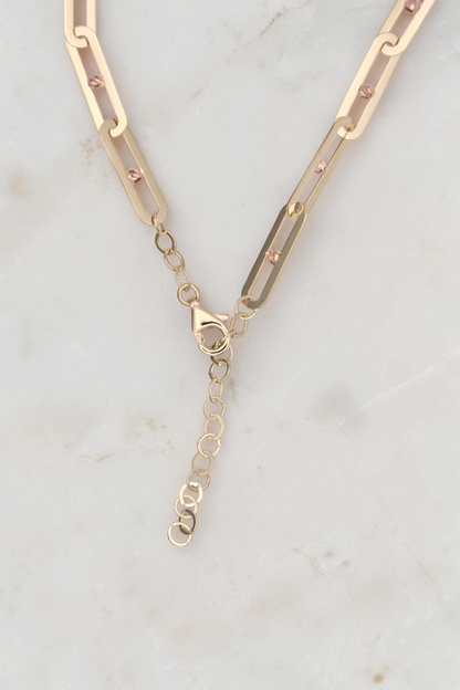 Zafrah 14k solid gold paperclip link bracelet with adjustable chain and rose gold bead accents