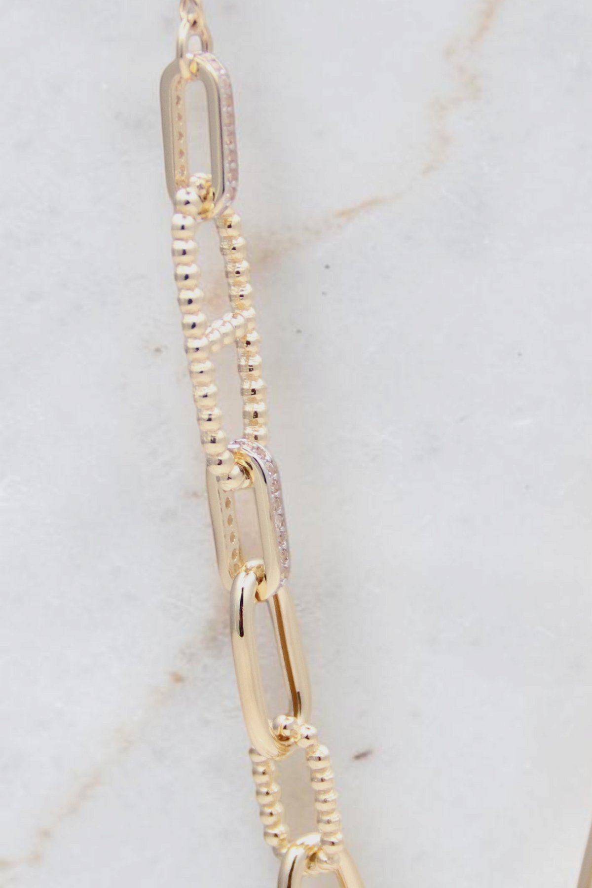 Zafrah 14k solid gold 18-inch necklace featuring alternating paperclip and textured oval links