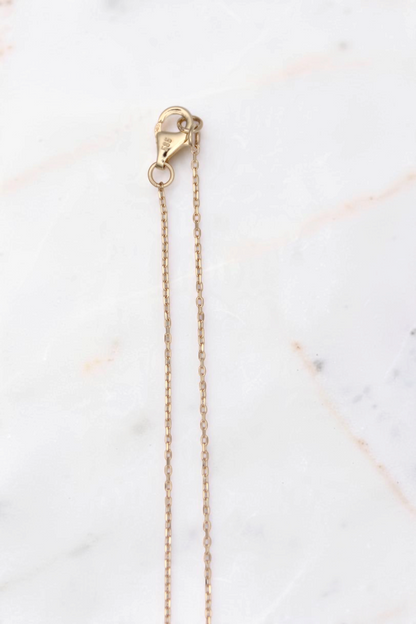 Zafrah 18-inch solid 14k yellow gold cable chain necklace with a secure lobster clasp closure.