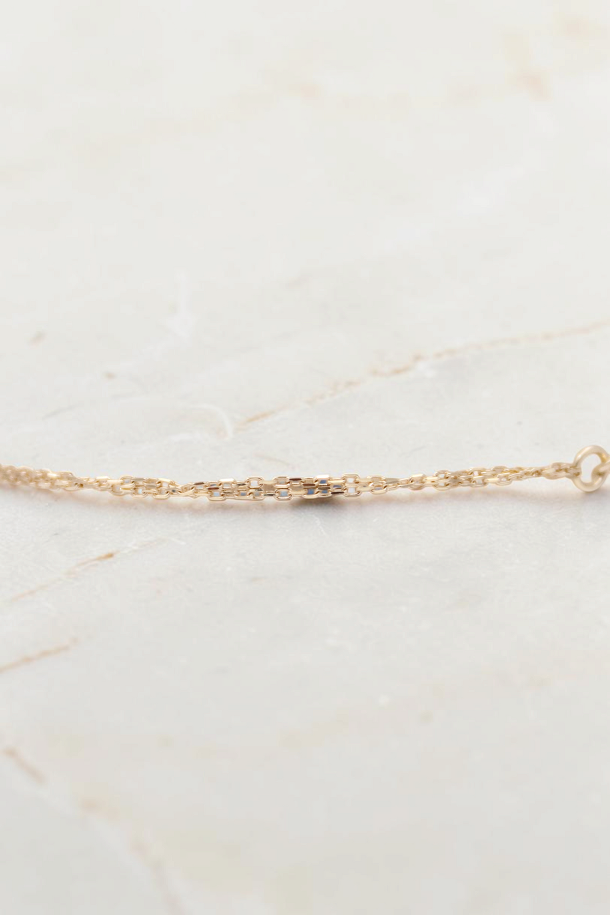 Zafrah 7-inch double cable chain bracelet crafted in 14k solid gold with delicate round links.