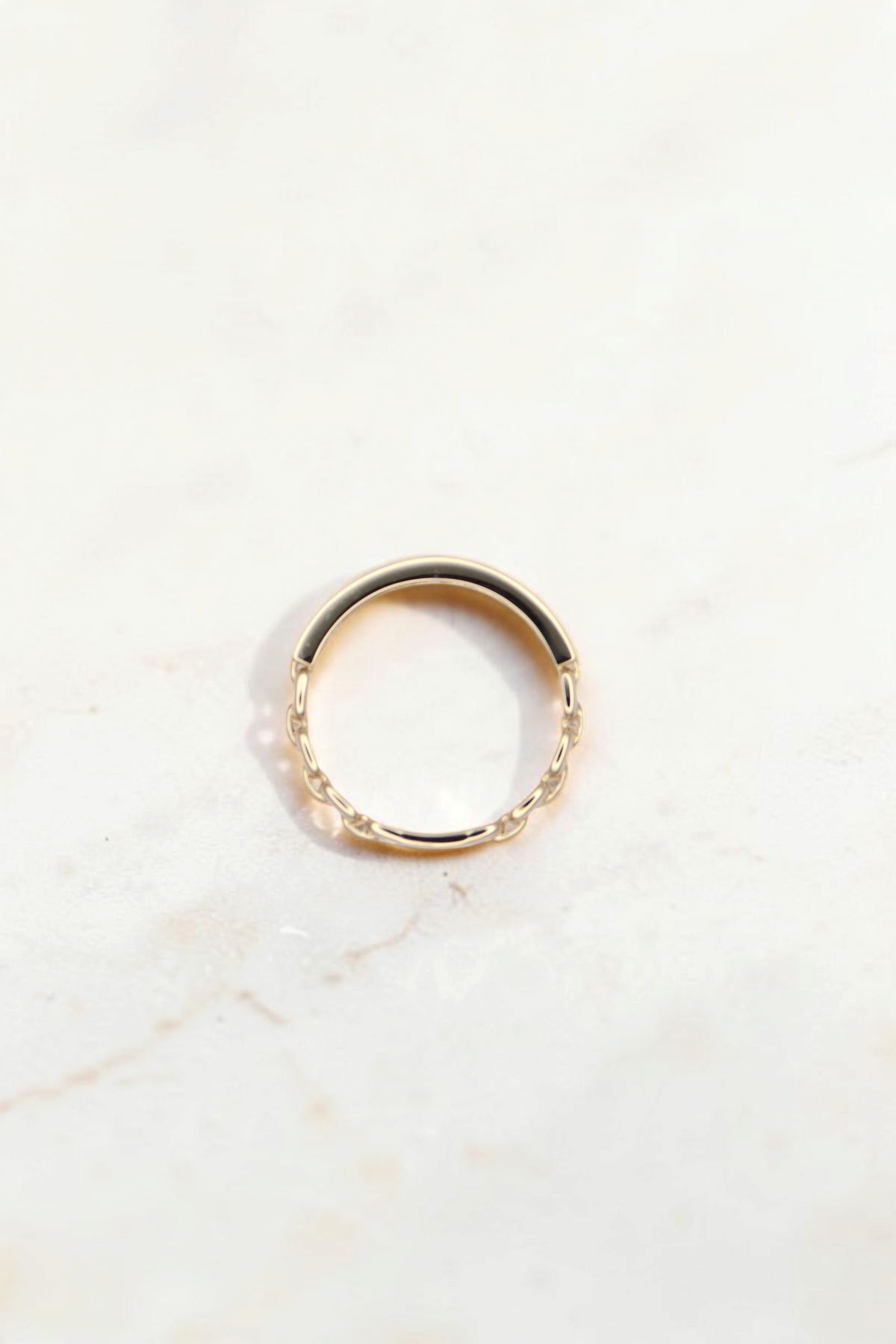Zafrah 14k solid gold chain link ring, size 7, featuring a delicate interlocking design on a white background.