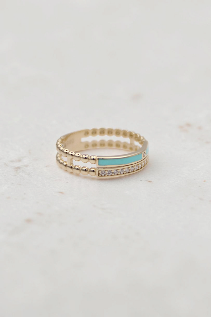 Zafrah 14k solid gold double beaded band ring featuring a turquoise enamel inlay and a row of clear round stones.