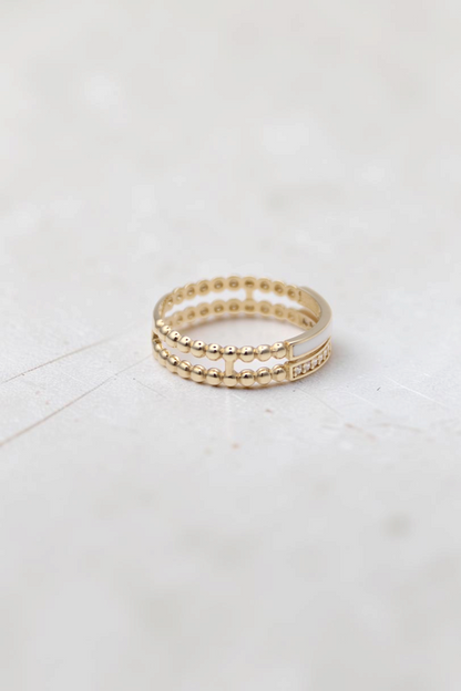 Zafrah 14k solid gold double beaded ring featuring clear stones and a smooth band section, size 7.