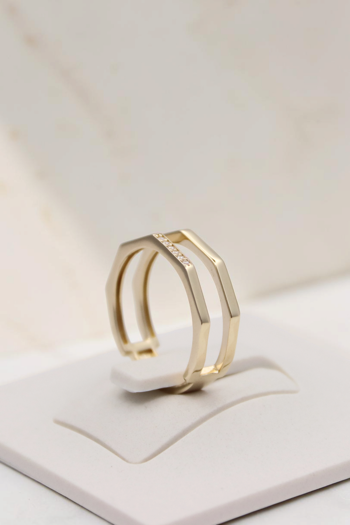 Zafrah double geometric band ring in solid 14k yellow gold with flat edges and delicate accent stones