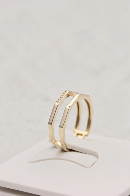Zafrah double geometric band ring in 14k yellow gold with flat edges and a small row of sparkling accent stones
