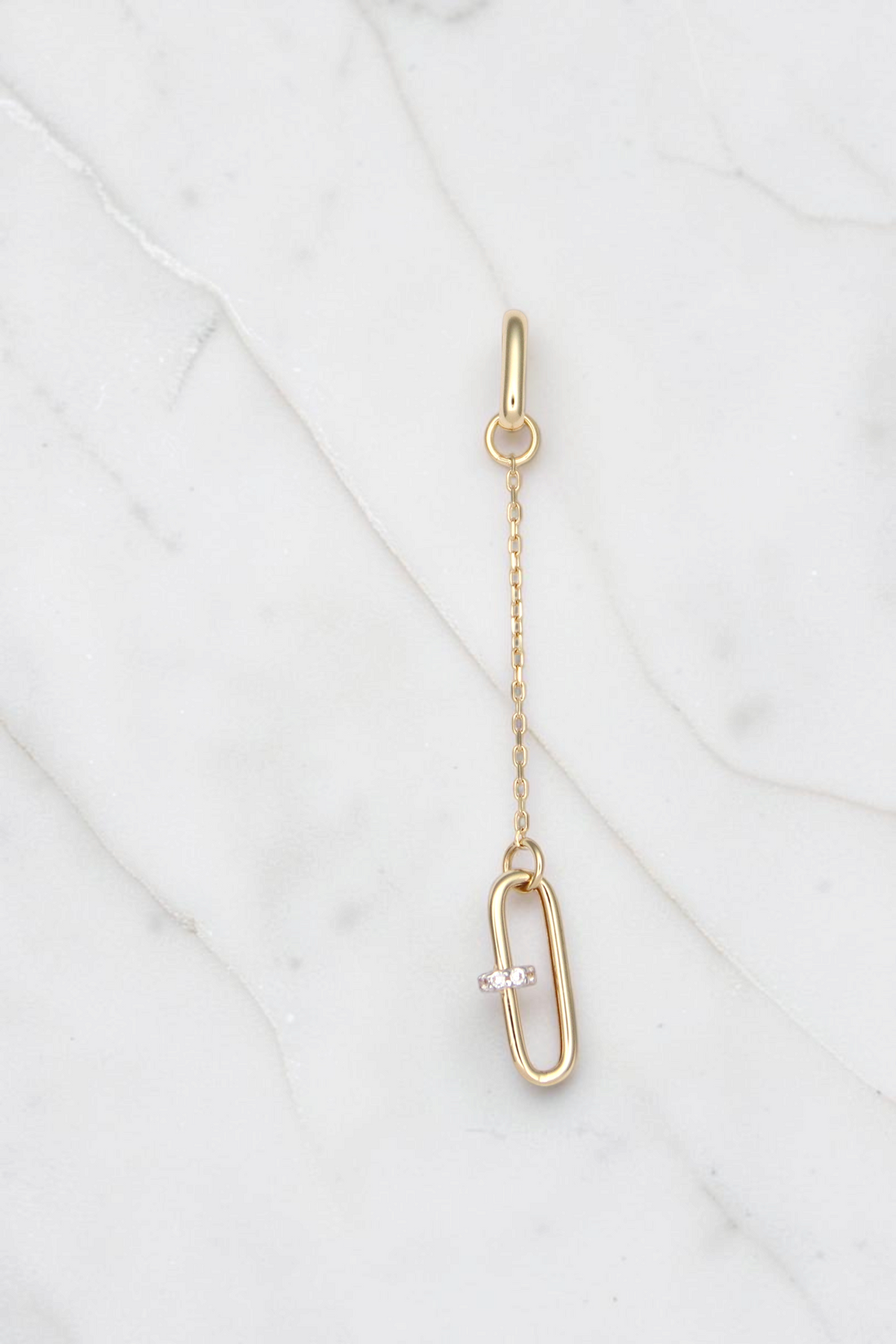 Zafrah 14k solid gold paperclip drop earrings featuring a delicate chain and a small diamond accent link