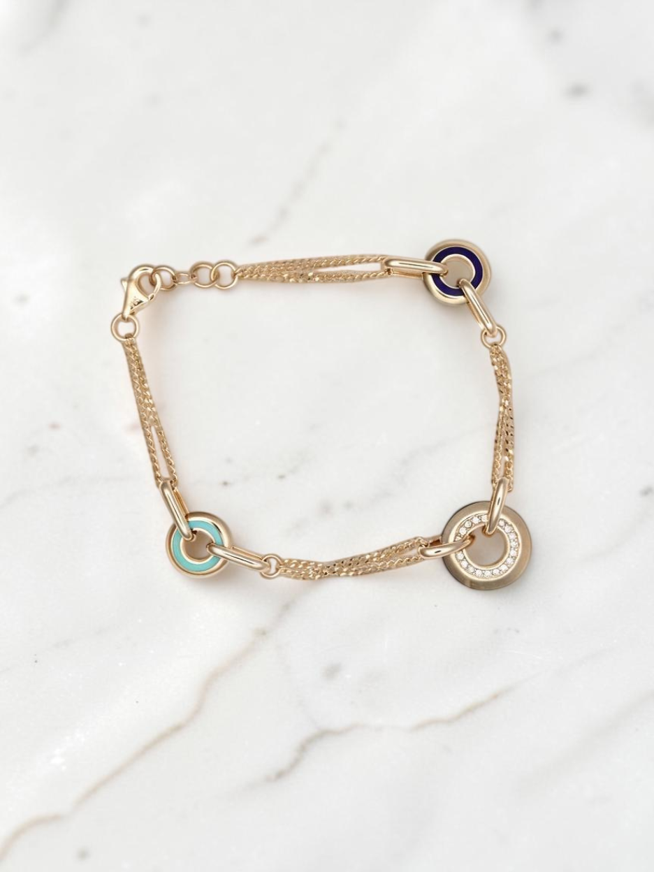 Zafrah 14k solid gold curb chain bracelet featuring turquoise, blue, and CZ stone-accented round and oval links.