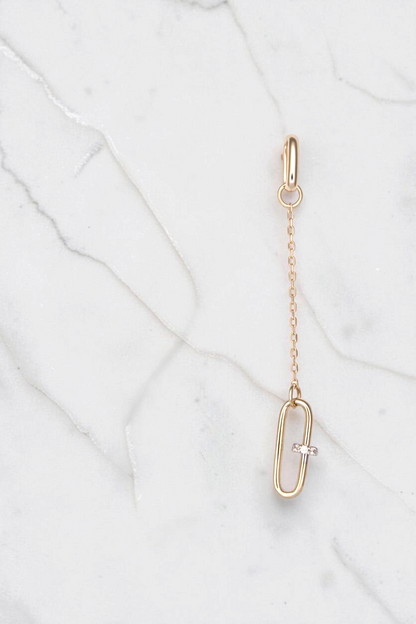 Zafrah 14k solid gold paperclip drop earrings featuring a delicate chain and a single diamond-accented link.