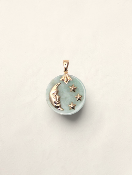 Zafrah 14K yellow gold pendant featuring a round jade disc with a celestial moon and star design