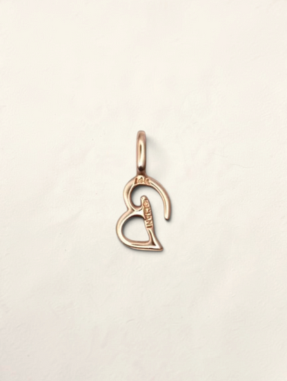 Zafrah 14K yellow gold initial B pendant with a polished finish on a neutral background